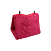 A magenta plush bird hammock tent with a quilted pattern.
