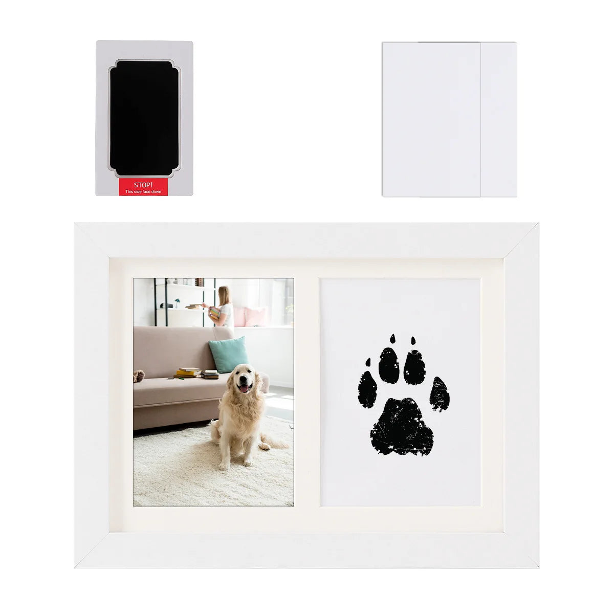 A white framed picture featuring a black dog paw print on a white background.