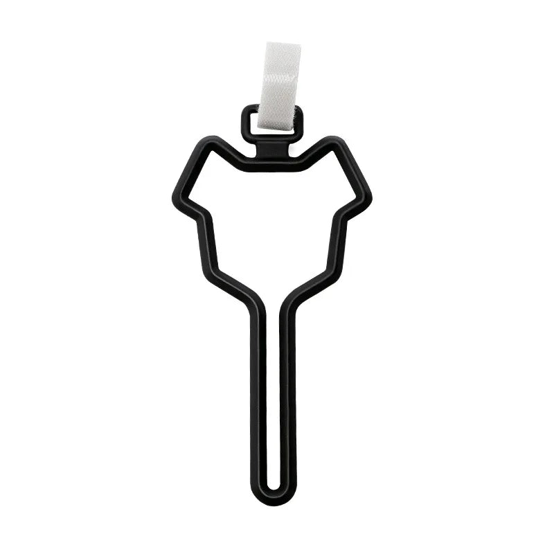 Black hands-free dog poop bag dispenser with a white leash clip.