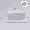 A silver snake chain necklace with a heart charm displayed on a white box.