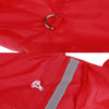 Close-up of a red waterproof raincoat for dogs showing a silver snap button and a gray zipper detail.