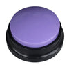 A round purple button with a black base for pet communication recording.