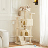 A light beige cat tree tower with four tiers, featuring cozy condos and sisal scratching posts, placed in a bright room.