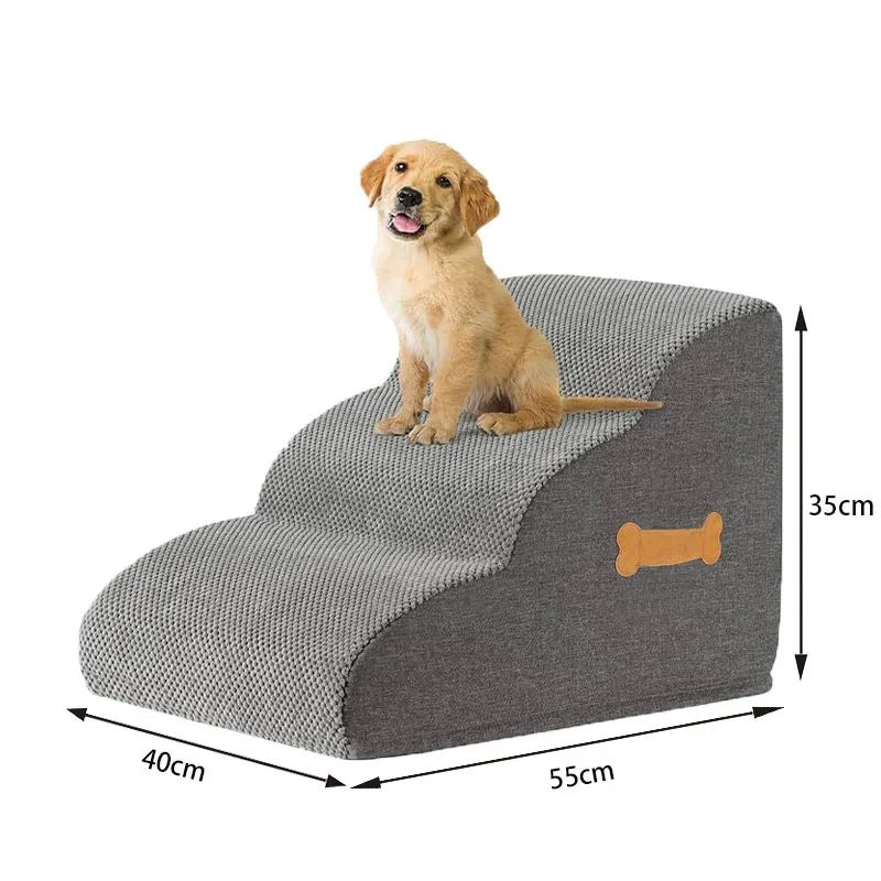 A golden retriever dog is sitting on a gray foam pet stair with a non-slip cover.