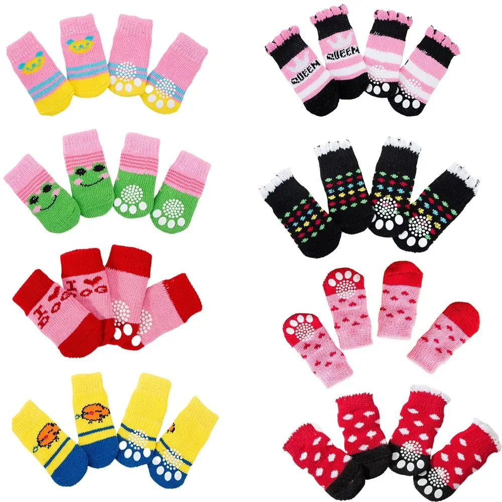 A collection of colorful anti-slip pet socks for dogs and cats in various patterns and colors.