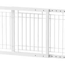 White adjustable wooden pet gate with vertical bars for indoor use