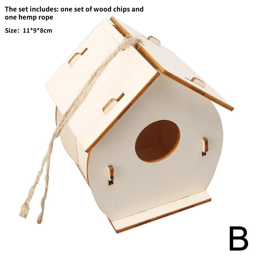 A light-colored wooden bird house kit including wood chips and a hemp rope, shown from above.
