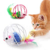 An interactive cat toy featuring a rolling mouse inside a pink wire cage and a white sand chamber.