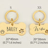 Gold bone-shaped stainless steel dog ID tags for Bailey and Willow, available in small and extra sizes.