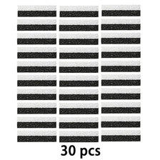 A grid of 15 black rectangular pieces, labeled as 30 pcs.