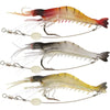 A collection of luminous soft shrimp lures for fishing, showing various translucent and colored baits on fishing lines.
