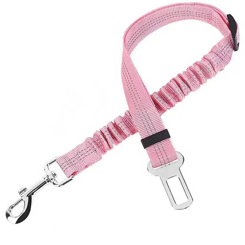 Pink adjustable dog car safety belt with a reflective strip and shock-absorbing bungee