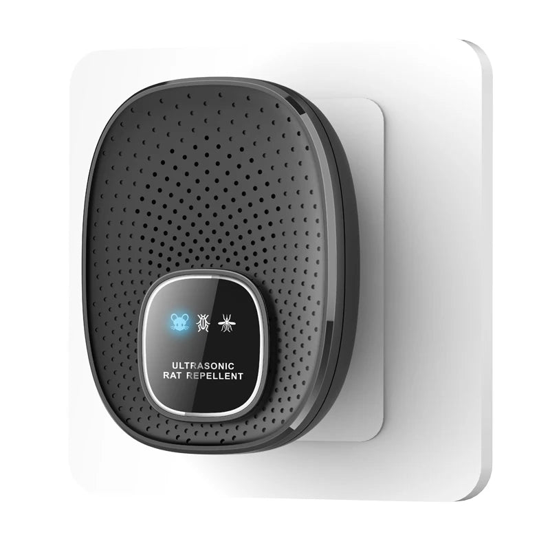 A round black ultrasonic rat repellent device mounted on a white wall plate.