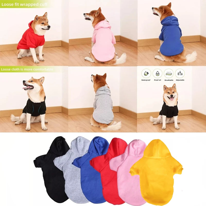 A variety of cozy autumn and winter hooded jackets for dogs in various colors including red, pink, blue, gray, black, and yel
