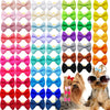 A collection of 100 polka dot pet bows in various colors and styles with rubber bands for dog hair accessories.