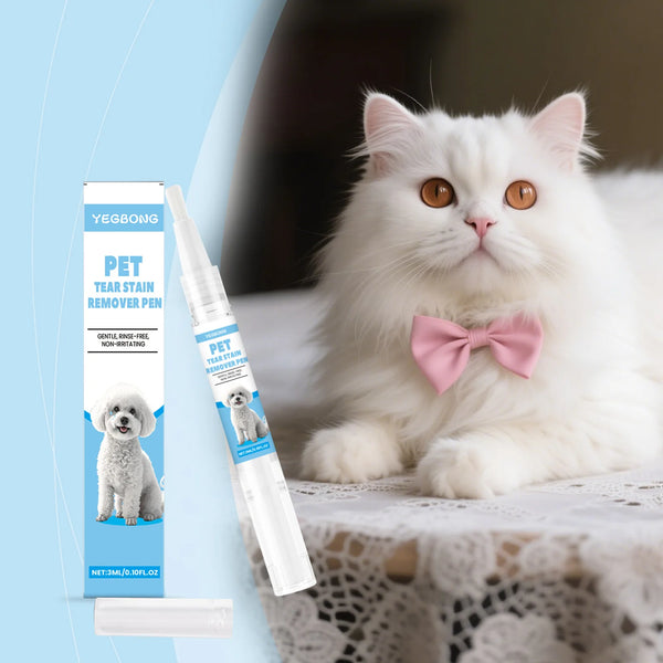 A fluffy white cat wearing a pink bow is sitting on lace fabric next to a bottle of PET Tear Stain Remover Pen.