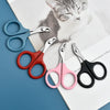 A collection of professional pet nail clippers and trimmers in various colors resting on a white background.