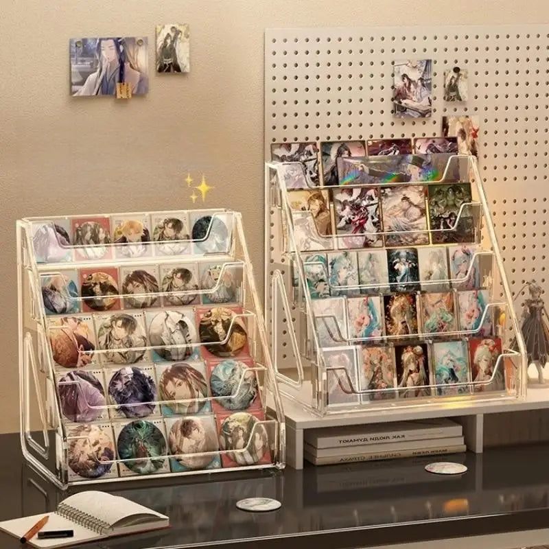 A clear acrylic display stand holds various business cards and brochures on a shelf.