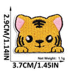 A yellow tiger face embroidered iron-on patch with black stripes and pink ears.