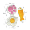Three natural loofah cat chew toys shaped like paws, eggs, and a fish with catnip.