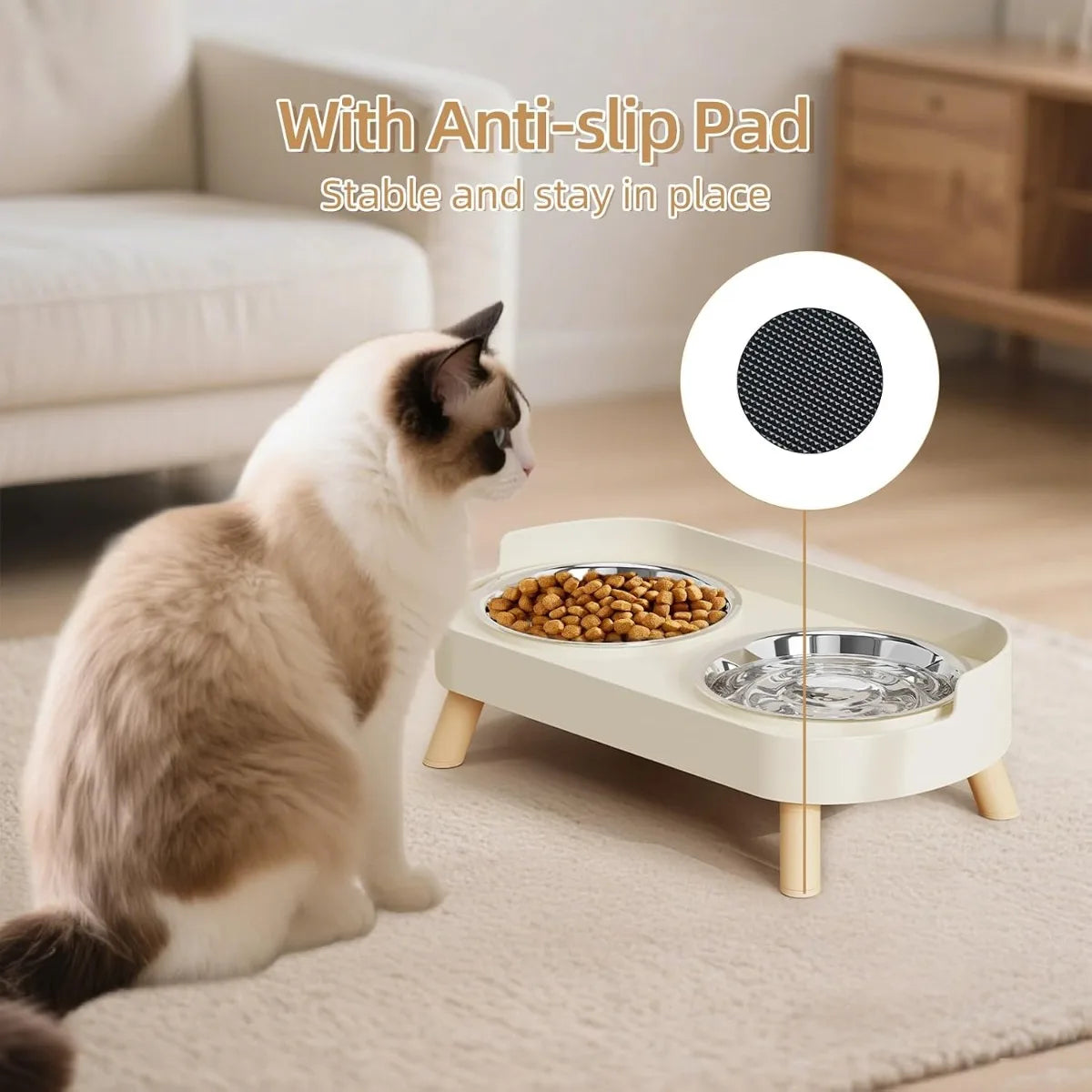 A cat is sitting next to a white elevated food and water bowl set with an anti-slip pad.