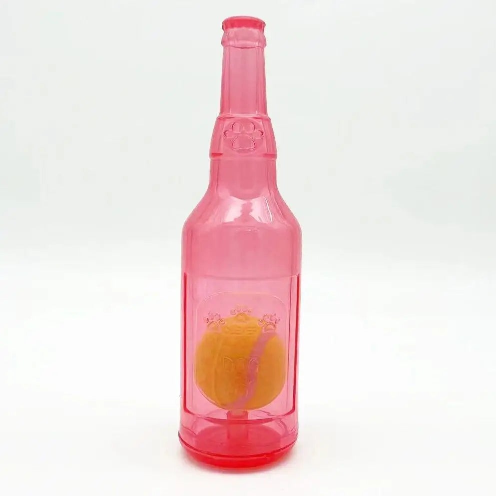 A pink plastic bottle shaped like a tennis ball chew toy for dogs