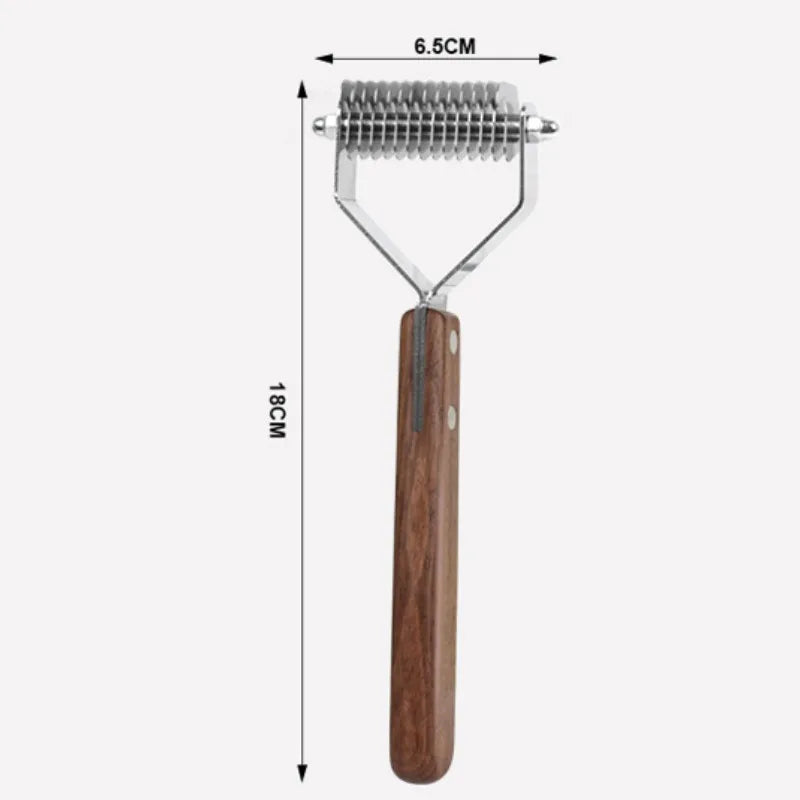 A wooden dog grooming comb and brush set with a metal comb attachment.
