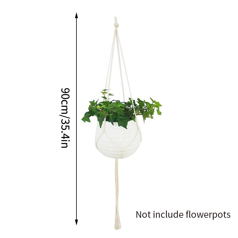 White macrame plant hanger with a hanging pot and a long cord for indoor or outdoor decor