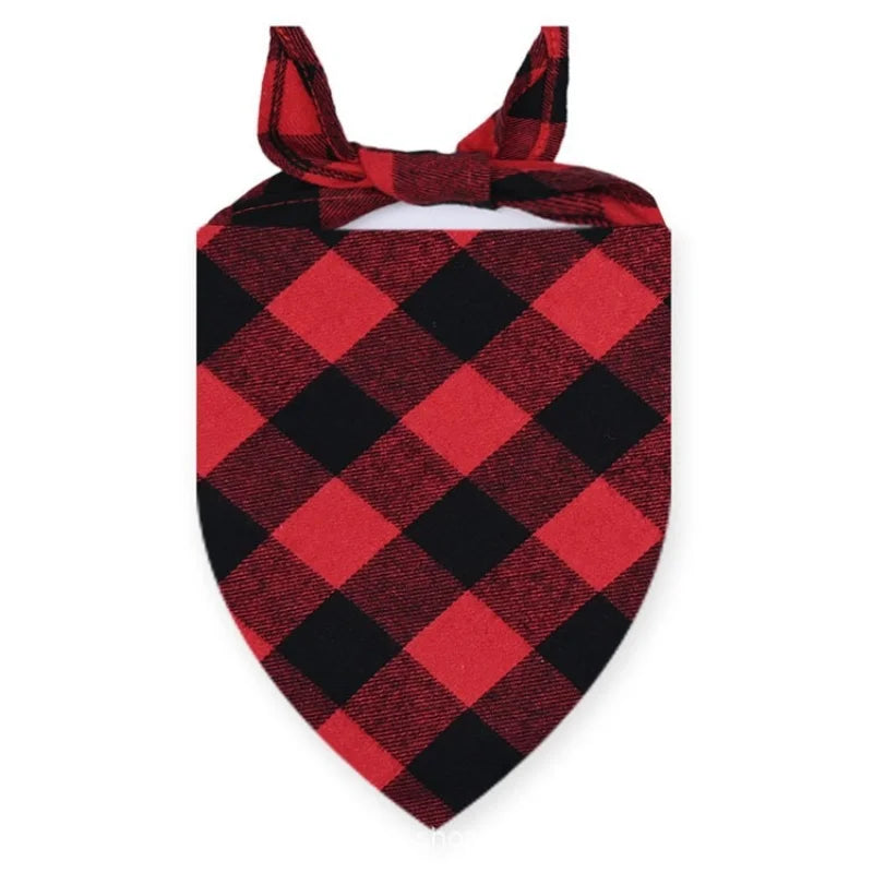 A red and black plaid bandana for dogs with a tie knot.