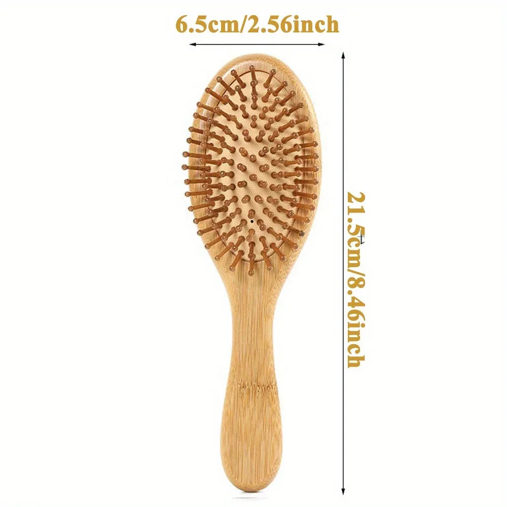A wooden bamboo hair brush with massage bristles shown vertically, measuring 6.5cm wide and 21.5cm long.