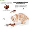 An interactive chirping bird cat toy with flapping wings is shown interacting with a cat.