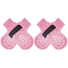 Pink anti-slip dog socks with traction straps for pets