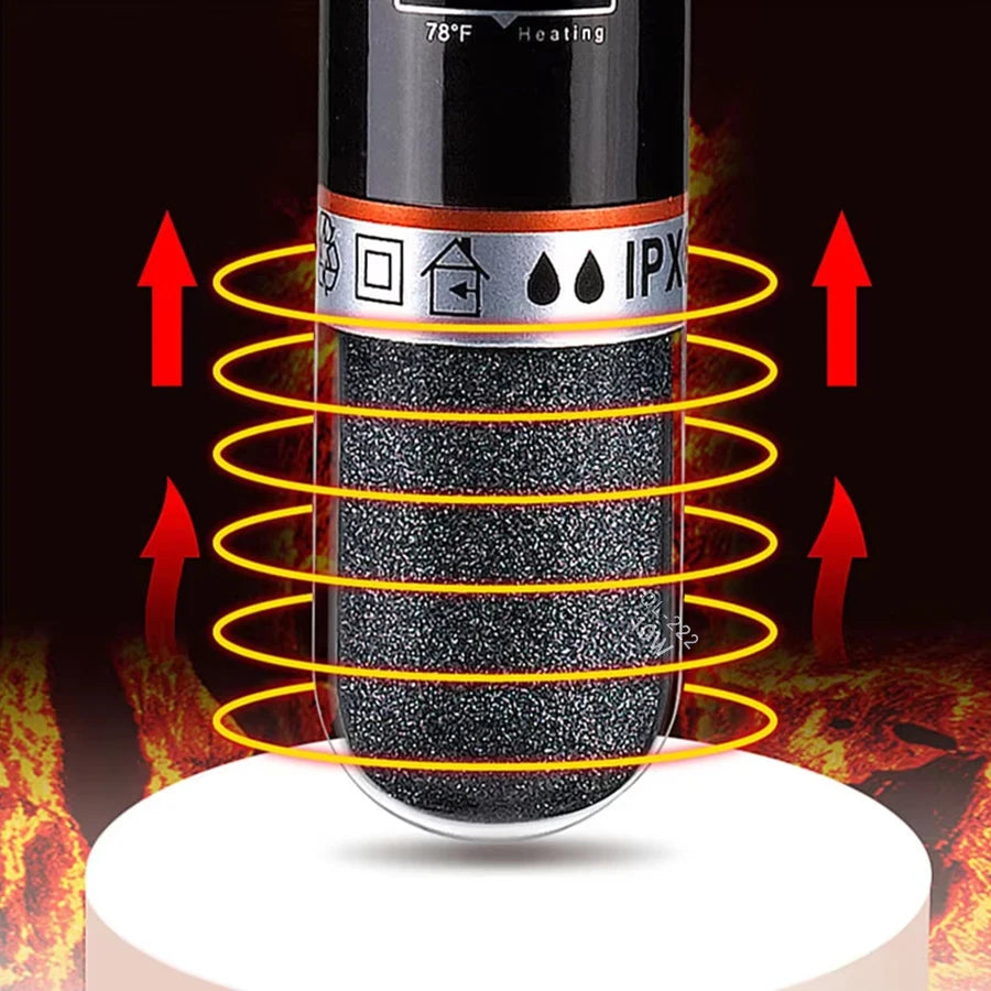 A close-up of a black USB mini aquarium heater with an IPX rating and heating element, shown above a glowing surface.