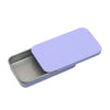 A purple compact sliding lid tin box for storing treats, pills, and small items.