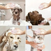 Hands are bathing a dog and a cat with a gentle bath brush and shampoo dispenser.