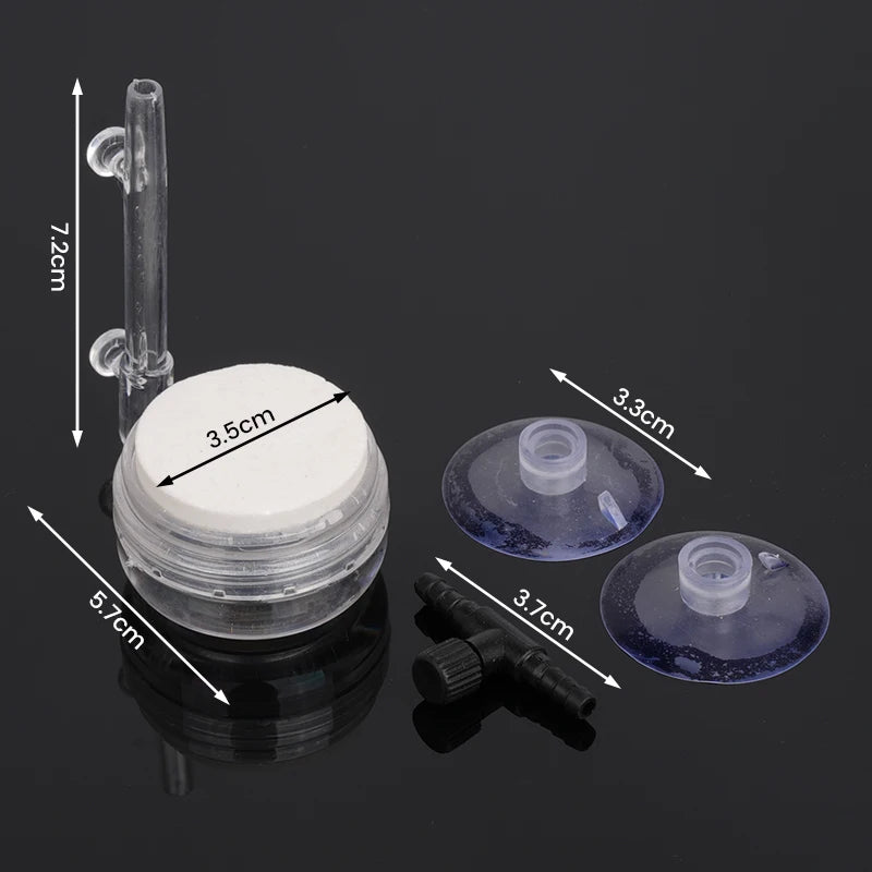 A clear glass diffuser with a suction cup, measuring 7.2cm in length and 5.7cm in diameter.