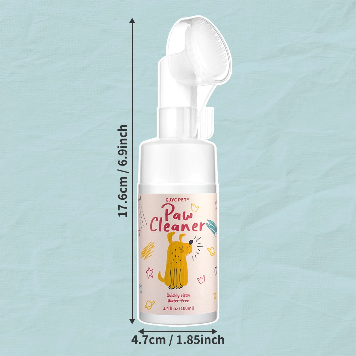 A white bottle of Pet Paw Cleaner foam for cats and dogs with a green cap and a foam applicator visible.