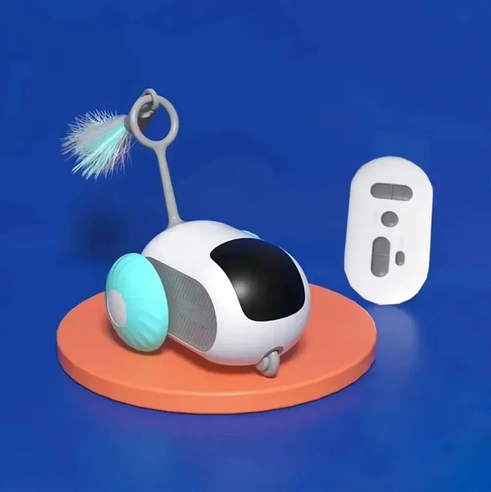 A white interactive automatic pet toy car resting on an orange base with a feather duster attached.