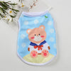 A light blue sleeveless vest for a small dog or cat featuring a cute pink bear design and a blue bow.