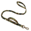 Heavy-duty tactical dog leash with dual handles and shock-absorbing bungee in camouflage pattern
