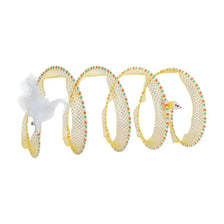 A foldable cat hunting tunnel for indoor play made of yellow mesh.