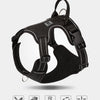 Black pet harness designed for no pull featuring quick-release buckles and a fully wrap body.