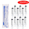 Un paquet de 100 seringues Luer en plastique pour la mesure de liquides, montrant diverses tailles de 1 ml à 10 ml.