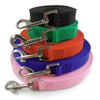 Stack of colorful durable nylon dog training leashes in black, green, orange, and purple.
