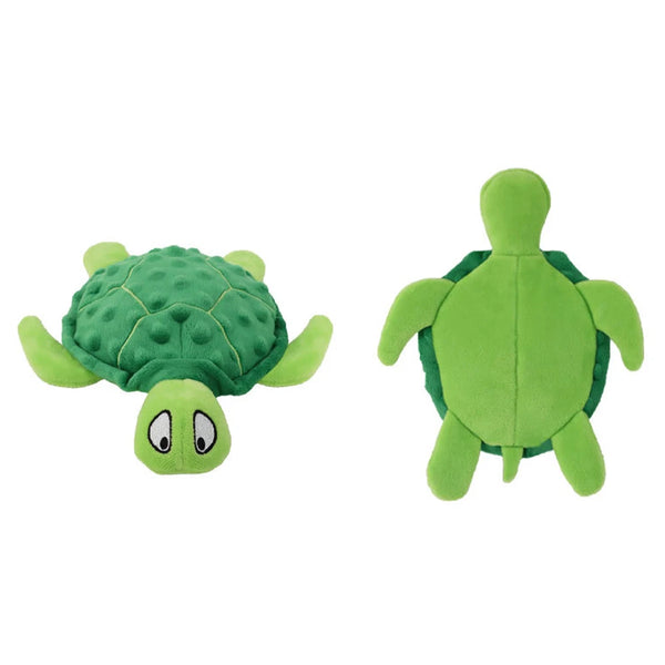 A bright green interactive sea turtle plush toy with a smiling face.