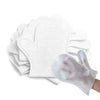Una pila de guantes desechables para quitar el pelo de mascotas, incluyendo un guante puesto en una mano.