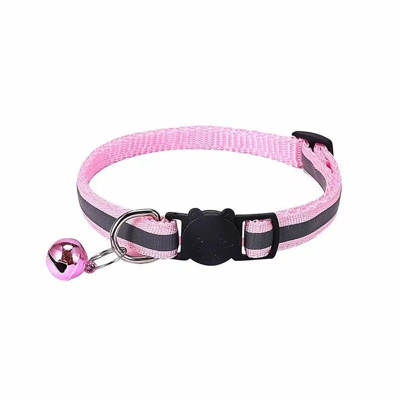 Pink reflective cat collar with a breakaway buckle and attached bell.