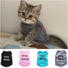 A set of four print vests for pets featuring the text I love my Mommy in black, pink, blue, and gray.
