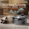 A black pet water fountain is shown next to a sleeping cat, emphasizing its ultra-quiet operation.