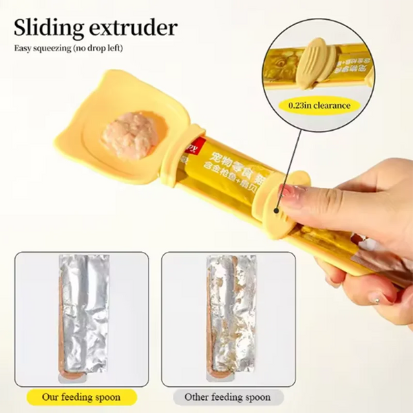 A hand is squeezing a yellow sliding extruder tool used for feeding wet food into a cat feeder.